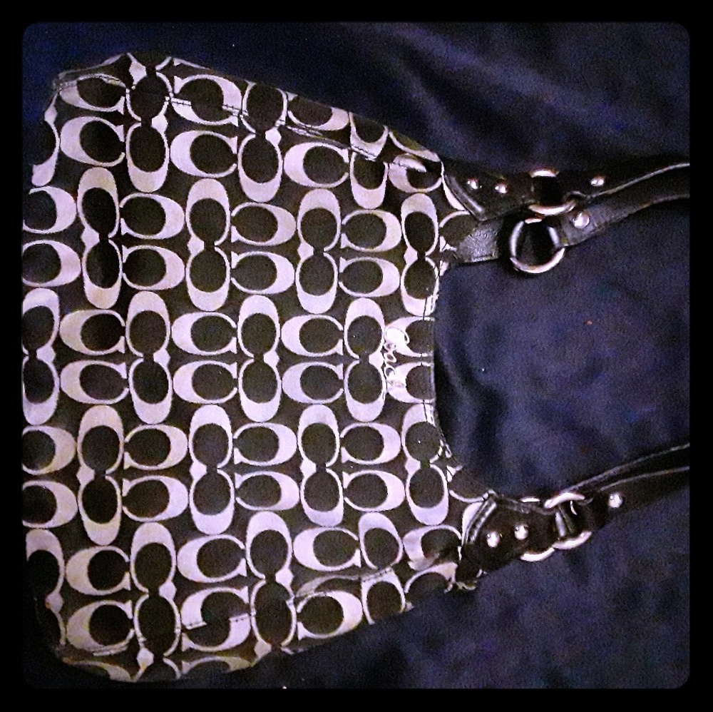 Black and grey Coach purse